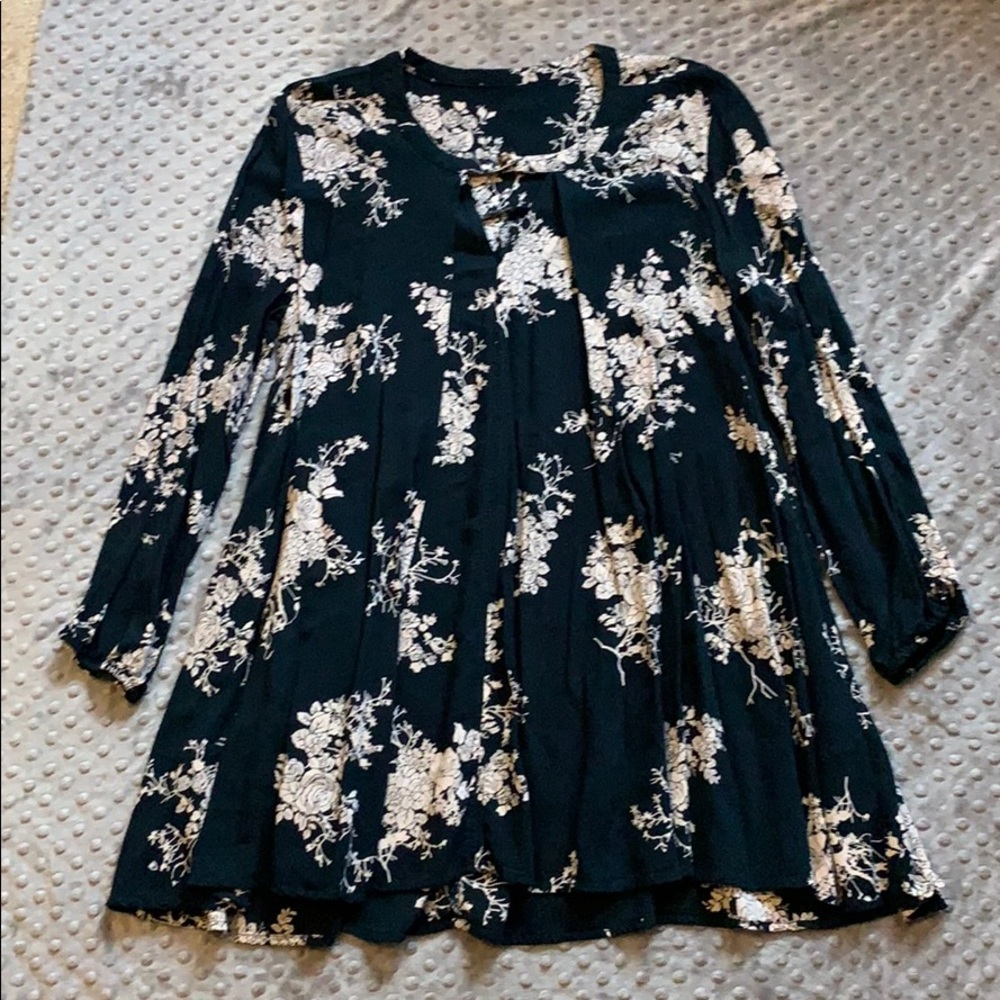 Dark teal/blue V-neck tunic with floral print